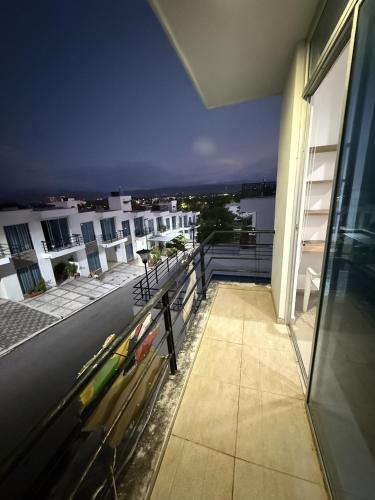 a balcony of a building with a view of a city at Casa Quinta con piscina Girardot- Via el Peñón in Girardot