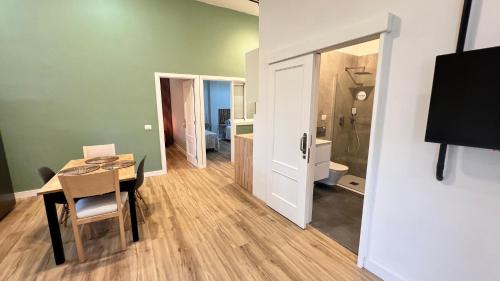 a room with a table and a dining room at Coastal Nest in Alcalá in Alcalá