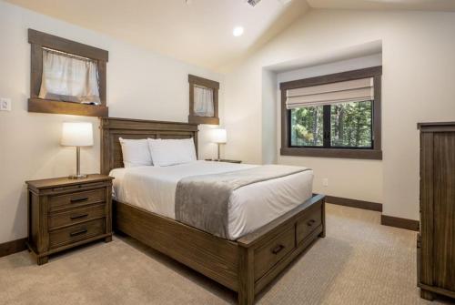 a bedroom with a large bed and two night stands at Suncadia 4 Bdrm Luxury Home in Cle Elum