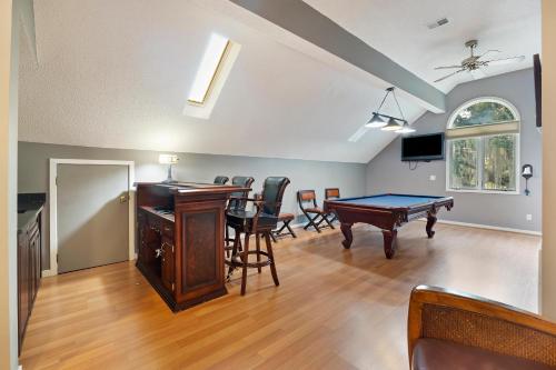 a living room with a ping pong table in it at MG3080: 3080 Marshgate in Seabrook Island