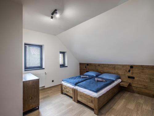 Postel nebo postele na pokoji v ubytování Villa in Bedrichov near ski resort
