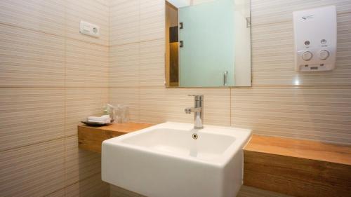 Koupelna v ubytování Tlogomas Guest House