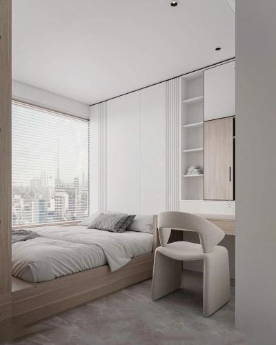 a bedroom with a bed and a chair and a window at Oceanus MT Vien Trieu Thai Ha Hotel & Apartment in Nha Trang