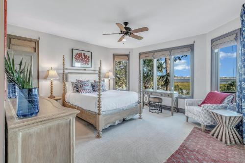 a bedroom with a bed and a ceiling fan at MG3083: 3083 Marshgate in Seabrook Island