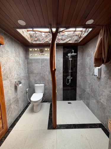 Ένα μπάνιο στο Ringsun Homestay Uluwatu