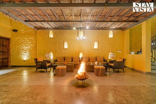 Χώρος καθιστικού στο StayVista at Pearl of the Dunes with Pool & Jacuzzi