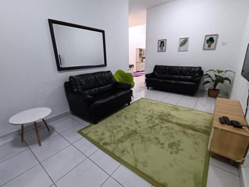 Χώρος καθιστικού στο Jitra Binjal Homestay
