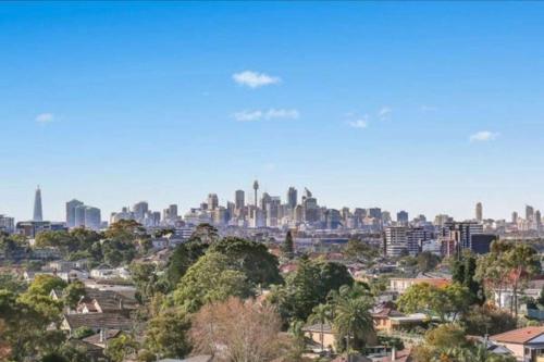 a view of the city of melbourne from the suburbs at Penthouse in Rockdale CBD in Sydney
