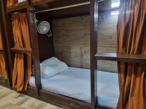 Postel nebo postele na pokoji v ubytování Unibed Dormitory