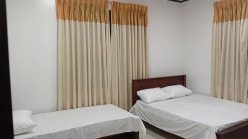 Postel nebo postele na pokoji v ubytování EcoBliss Villa