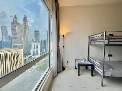Ένα ή περισσότερα κρεβάτια σε δωμάτιο στο Hostel Hub KL