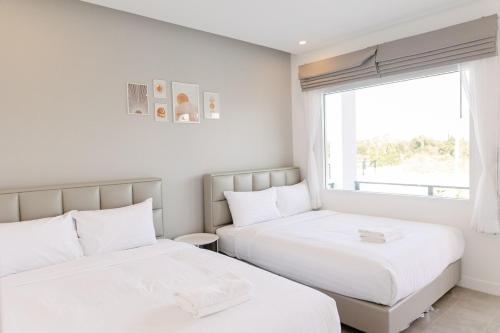 Voodi või voodid majutusasutuse Vanilla Pool Villa - Mari House toas