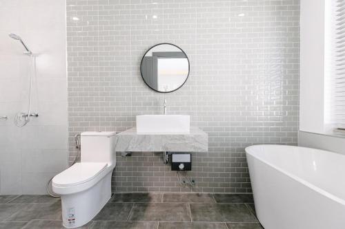 Vannituba majutusasutuses Vanilla Pool Villa - Mari House