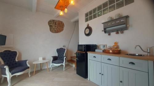 Kuchyň nebo kuchyňský kout v ubytování Sidus Rooms