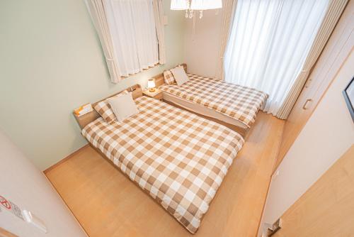Independent Home - One Minute Walk to Rail Hub - Direct Link to Asakusa Ueno Ginza Tokyo Sky Tower - 102 Square Meters with Four Rooms One Living Area Two Restrooms Two Baths - Easy Link to Both Major Airports
