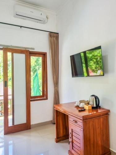 TV a/nebo společenská místnost v ubytování AUM Resort
