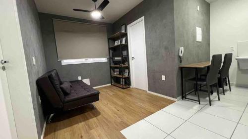 a living room with a couch and a table at Practical and cozy AP - Tatuapé Prox ao Metro in Sao Paulo