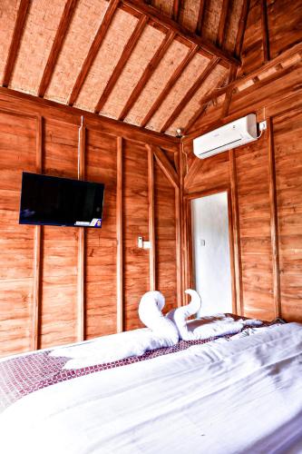 TV a/nebo společenská místnost v ubytování AUM Resort