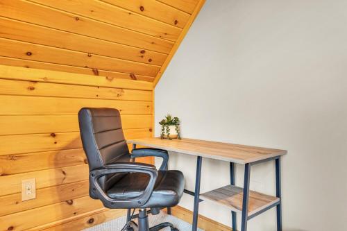an office with a desk and a chair at Private Chalet with Fireplace Hottub and Game Room in Bethel