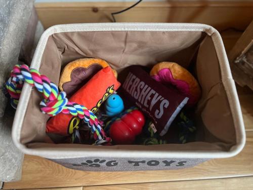 a basket filled with different types of toys at Private Chalet with Fireplace Hottub and Game Room in Bethel