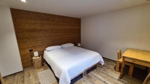 Postel nebo postele na pokoji v ubytování K2 home
