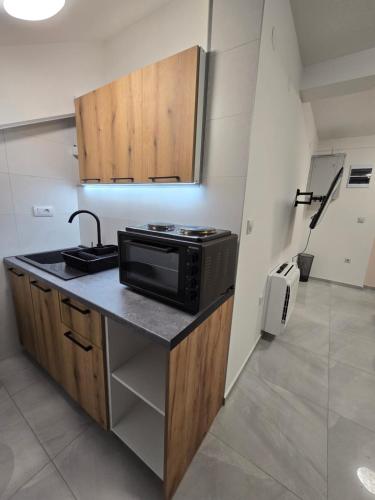 Η κουζίνα ή μικρή κουζίνα στο Doksim Luxury Apartments 202