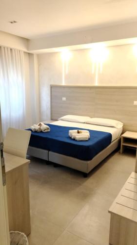 Postel nebo postele na pokoji v ubytování Bijou rooms