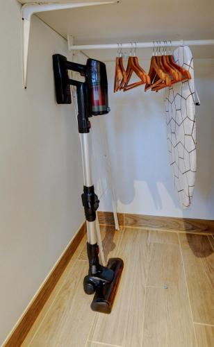 a robot standing on the floor in a room at Le Brière - Appart'Escale in Saint-Nazaire