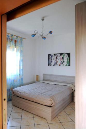 a bedroom with a large bed in a room at Le Residenze Salentine - Case Vacanza in Lecce in Lecce