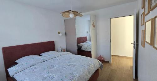 Postel nebo postele na pokoji v ubytování Splendide 2,5 pièces Lens