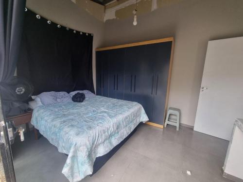 Ένα ή περισσότερα κρεβάτια σε δωμάτιο στο Casa 3 quartos