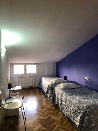 Posteľ alebo postele v izbe v ubytovaní Apartamento Turístico Sigüenza
