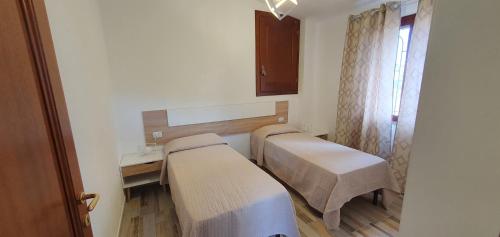 Ένα ή περισσότερα κρεβάτια σε δωμάτιο στο AME house