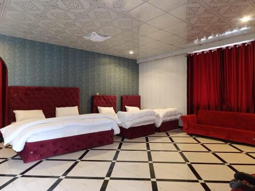 Katil atau katil-katil dalam bilik di Galaxy Hotel Swat Kalam