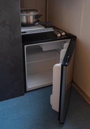 Kuchyň nebo kuchyňský kout v ubytování Apartament Odertal