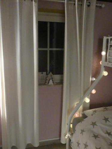 Cama o camas de una habitación en Gîte La Maison Jaune