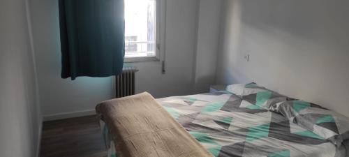 Ένα ή περισσότερα κρεβάτια σε δωμάτιο στο Cómo en casa Villablino