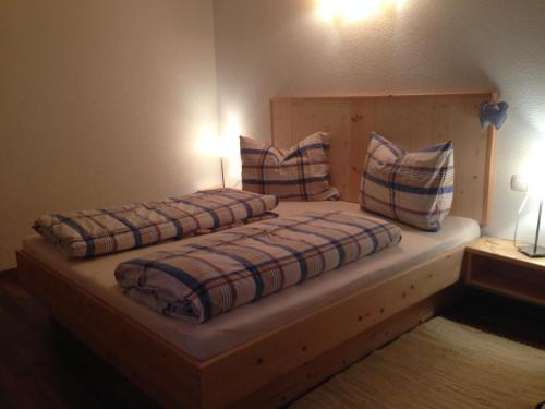 Ein Bett oder Betten in einem Zimmer der Unterkunft Haus Anemone