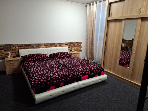 Ένα ή περισσότερα κρεβάτια σε δωμάτιο στο Rena