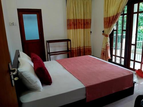 Postel nebo postele na pokoji v ubytování Paradise Residence Hanthana