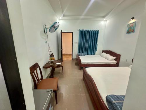 Ein Bett oder Betten in einem Zimmer der Unterkunft Hotels Phi Yến - Guest house Phi Yen