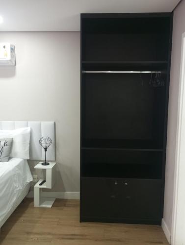 Un ou plusieurs lits dans un hébergement de l'établissement Studio 98 Centro SP , 25 de Março, bras, Santa Efigênia, bom retiro, Anhangabaú