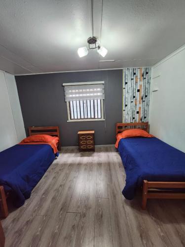 Ένα ή περισσότερα κρεβάτια σε δωμάτιο στο Casa Rosales