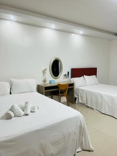 Katil atau katil-katil dalam bilik di Shiri Hotel