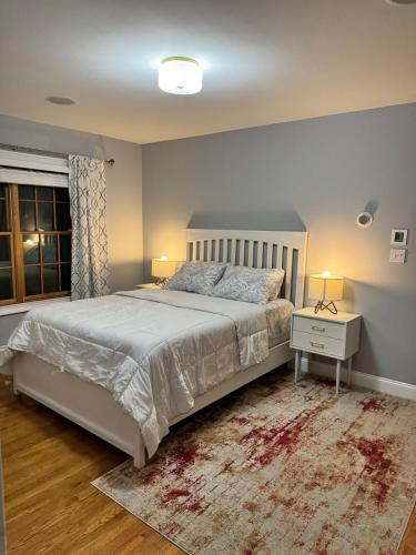 Ένα ή περισσότερα κρεβάτια σε δωμάτιο στο Cozy Room by Hofstra University