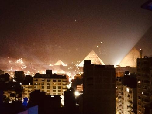Nespecifikovaný výhled na destinaci Giza nebo výhled na město při pohledu z hotelu