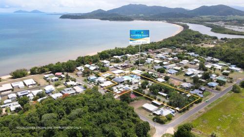 an aerial view of a resort next to the water at Kurrimine Beach Holiday Park in Kurrimine Beach