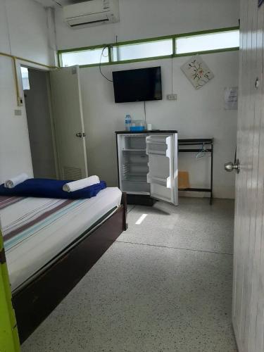 Postel nebo postele na pokoji v ubytování Sukhothai Hotel