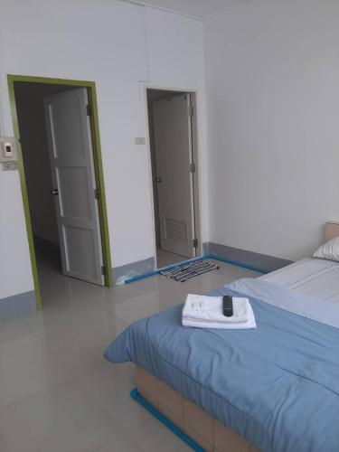 Postel nebo postele na pokoji v ubytování Sukhothai Hotel