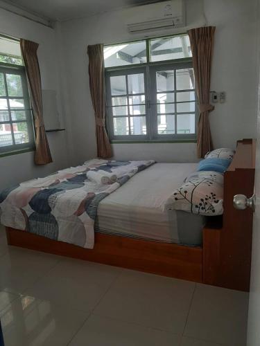 Postel nebo postele na pokoji v ubytování Sukhothai Hotel